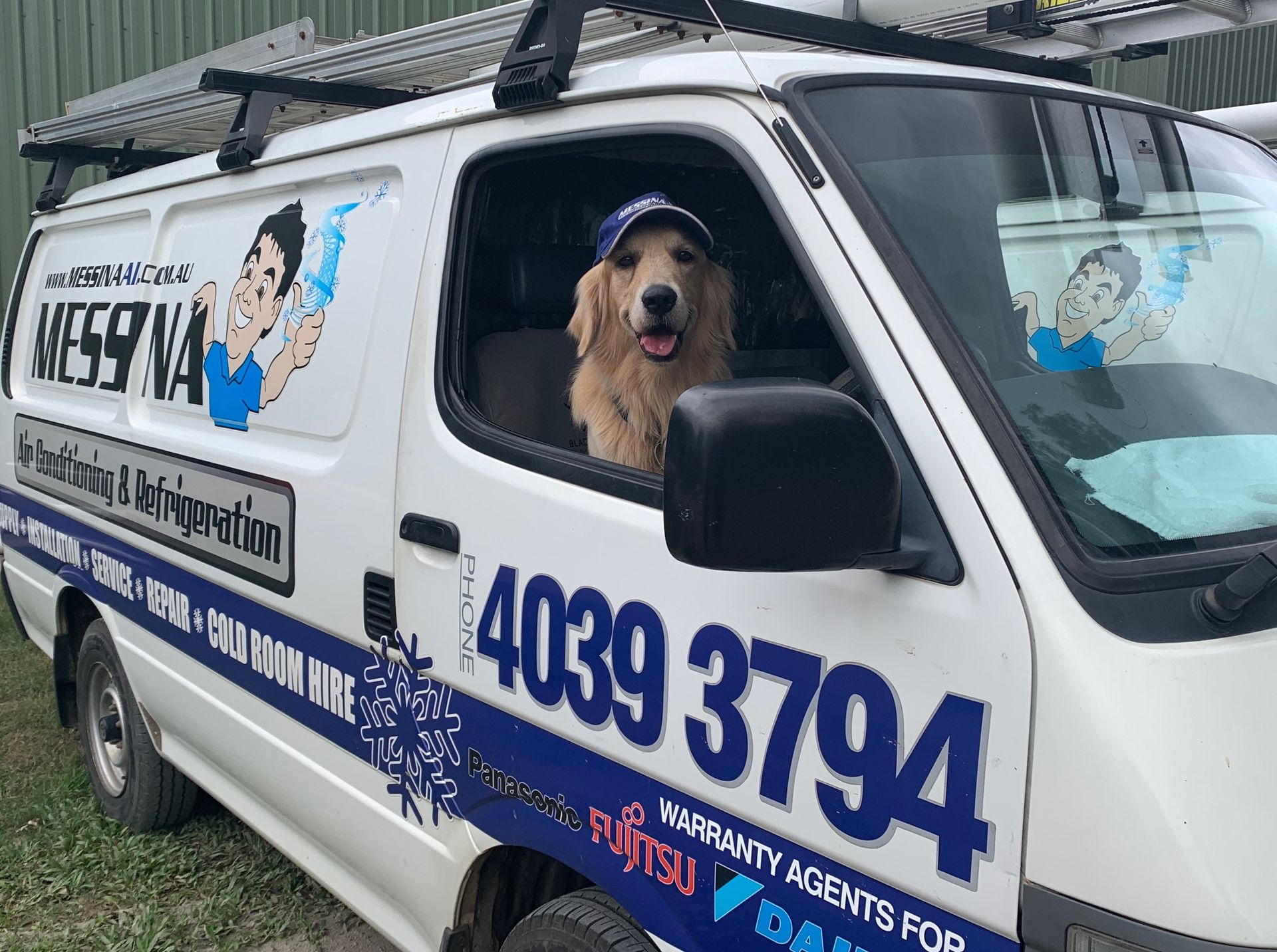 A Person Fixing an Air Conditioning Unit with A Screwdriver — Messina Air Conditioning & Electrical in Kuranda, QLD