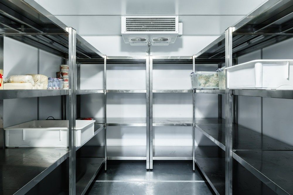 Stainless Steel Shelves in A Walk-In Refrigerator — Messina Air Conditioning & Electrical in Palm Cove, QLD