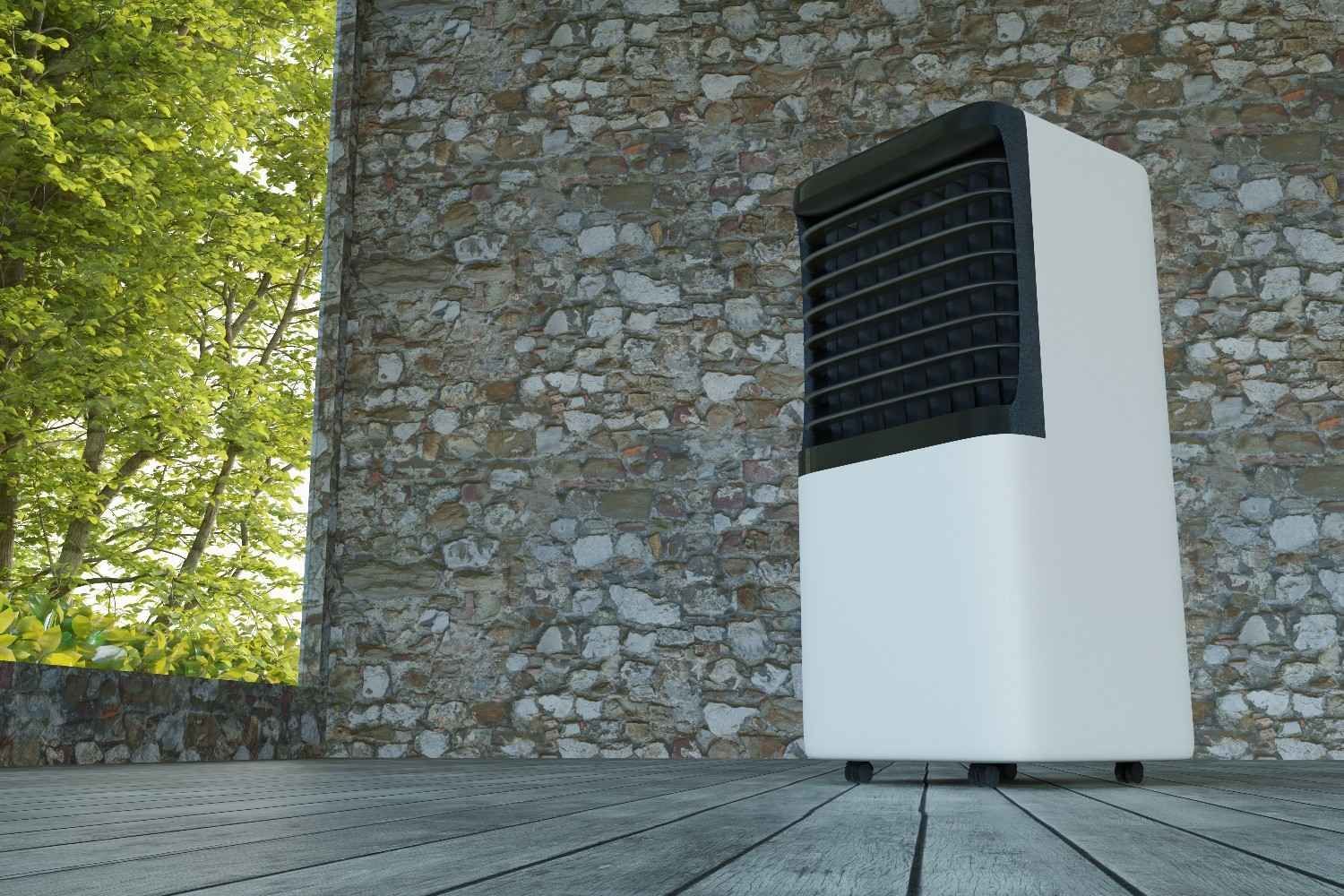 White Portable Air Cooler on A Wooden Deck Next to A Stone Wall — Messina Air Conditioning & Electrical in Portsmith, QLD