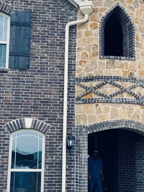 A residential gutter cleaning in Fort Worth, TX by PT Gutters