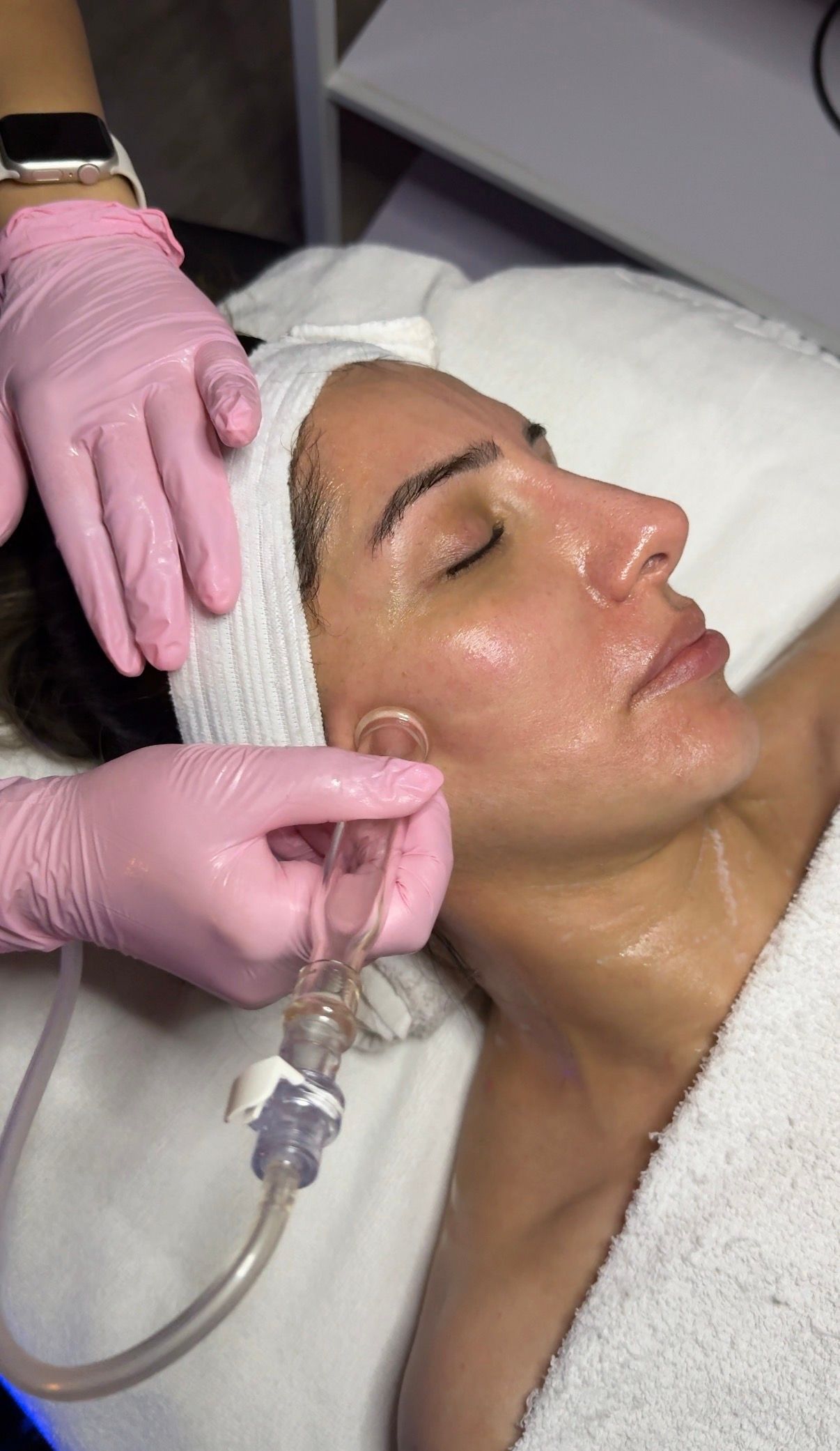 Person receiving a neck massage in a spa setting
