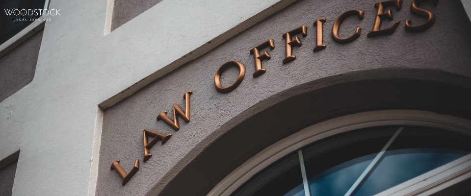 Woodstock Legal Services law office sign on the building exterior