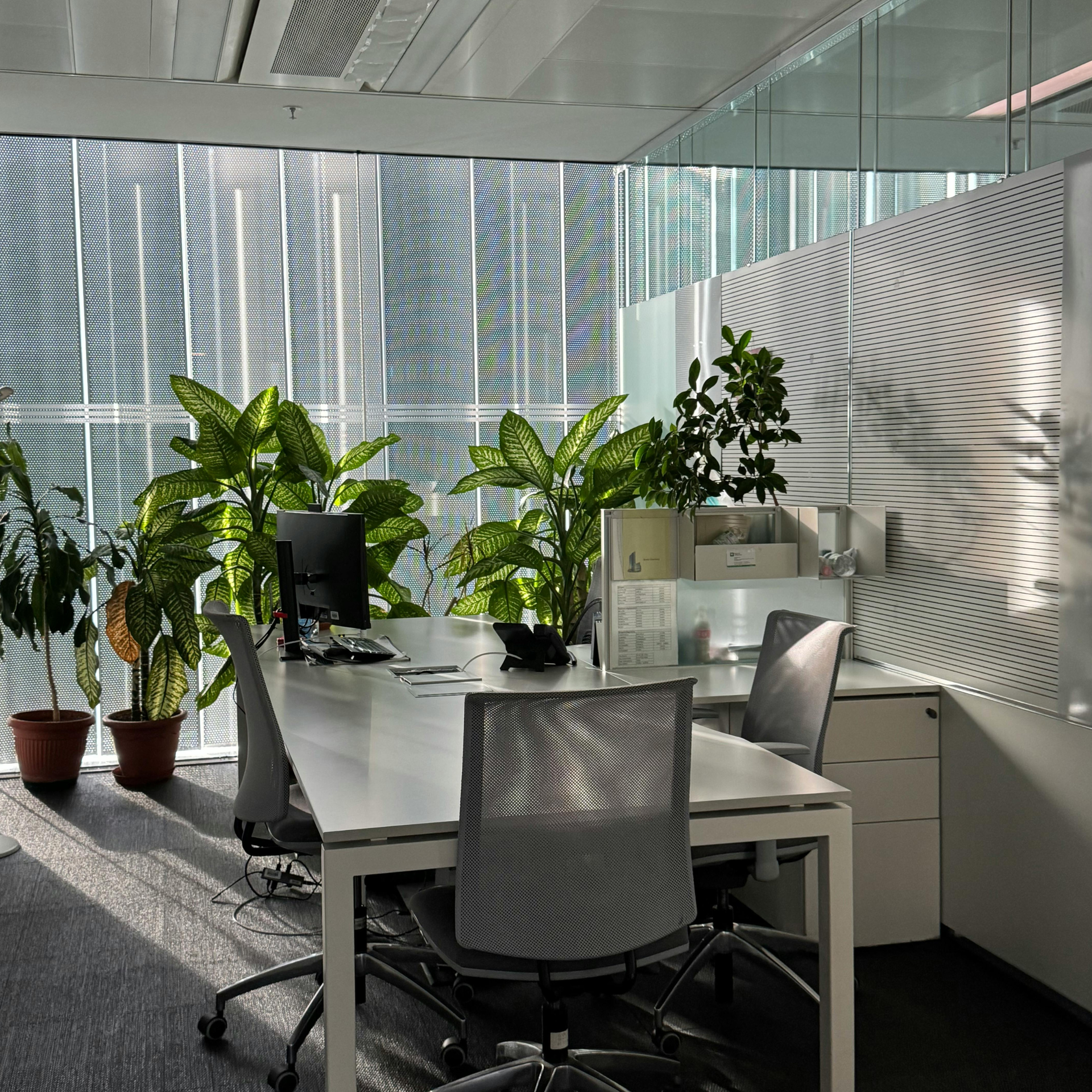 Empty commercial space with large city-view windows