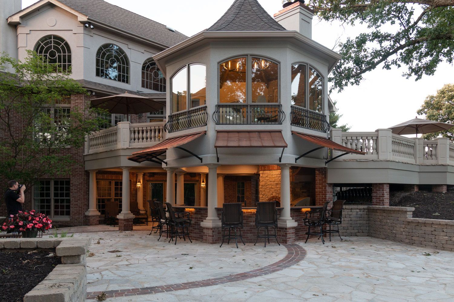 A large house with a gazebo in the backyard