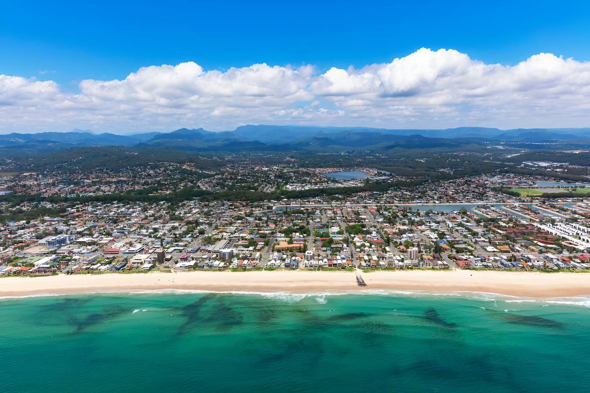 Aerial View of a Beach With a City in the Background — Mr Steam Clean Tweed Coast in Elanora, QLD