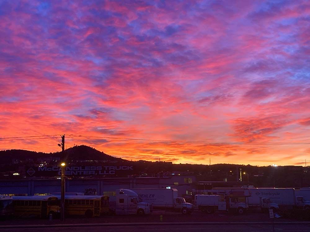 Vibrant sunrise over Mark Dabling Road in Colorado Springs