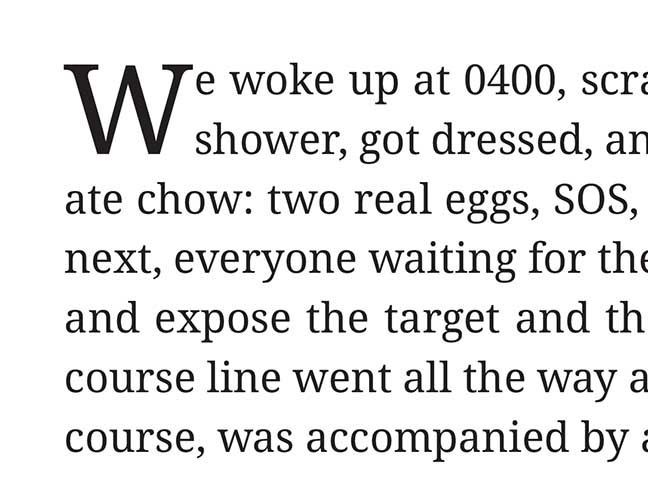 Cropped page of printed text in black serif font on white paper, starting with a large decorative “W”.