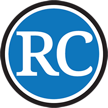 Blue circular logo with white “RC” letters and a black-and-white border