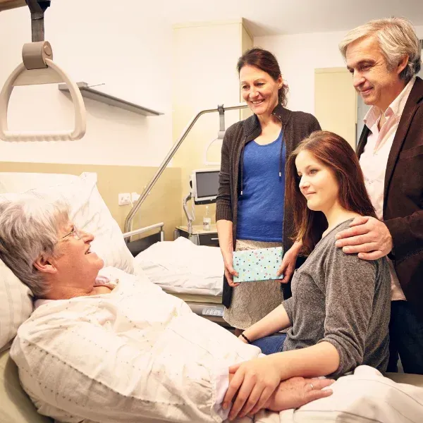 Image showing a truck accident victim recovering with family support in Atlanta.
