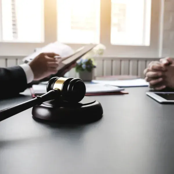 An image of an attorney providing legal representation to obtain financial compensation.