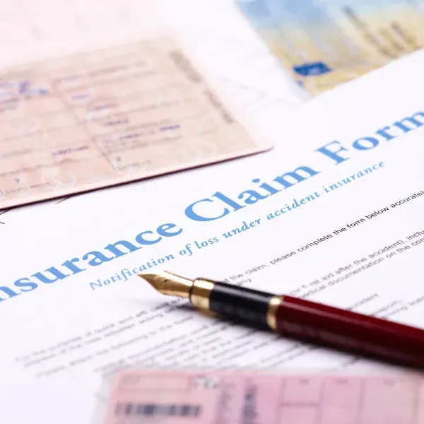Photograph representing insurance claim documents.