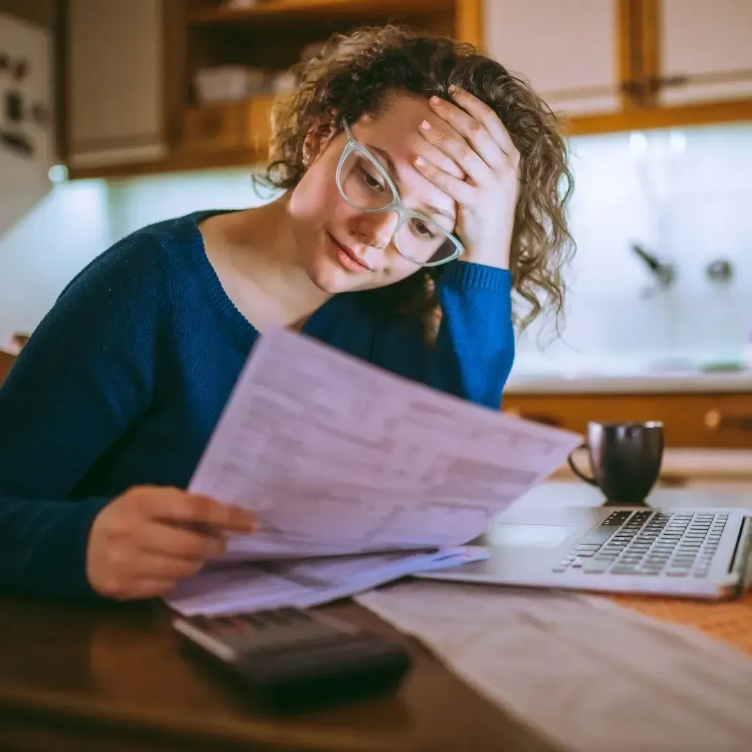 Image showing an injury victim comparing attorney fees.