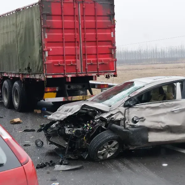 A picture showing the aftermath of an underride collision with an 18-wheeler in Georgia.