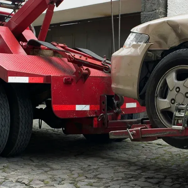 An image showing a tow truck collision during roadside assistance.
