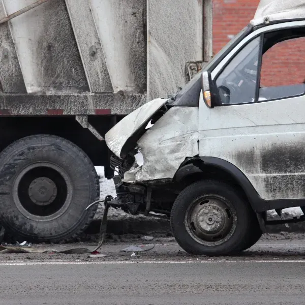 An image showing a dump truck rear-end collision.