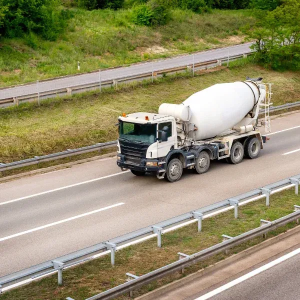 An image showing a cement mixer crash on the road in Georgia to a construction site.