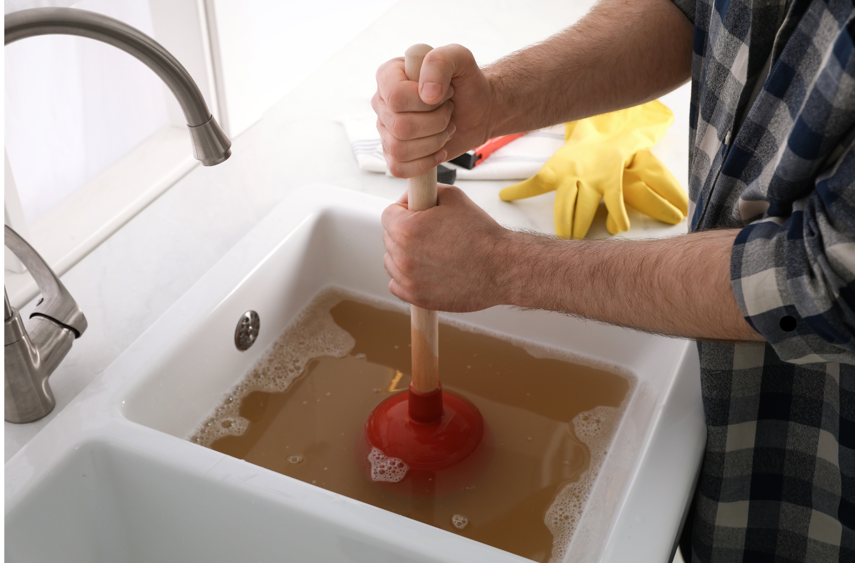emergency drain cleaning service clearing a clogged sink 