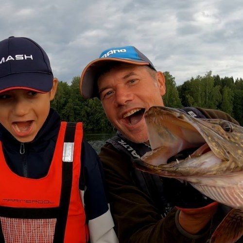 Dad and son pike fishing