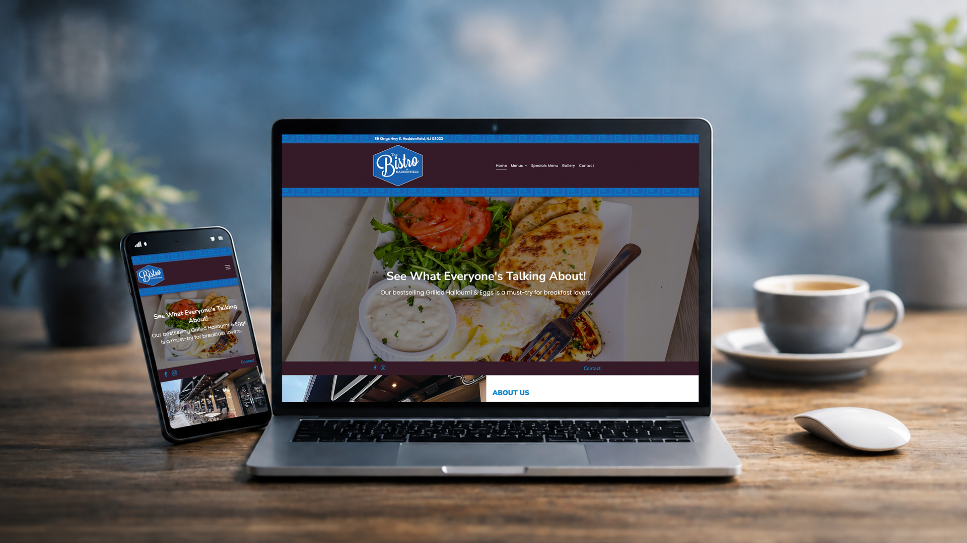 Laptop and smartphone on a desk displaying a food website, with coffee cup and mouse nearby.