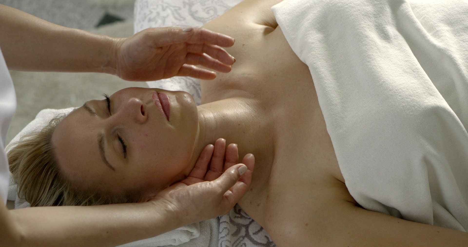 A woman is getting a massage at a spa.