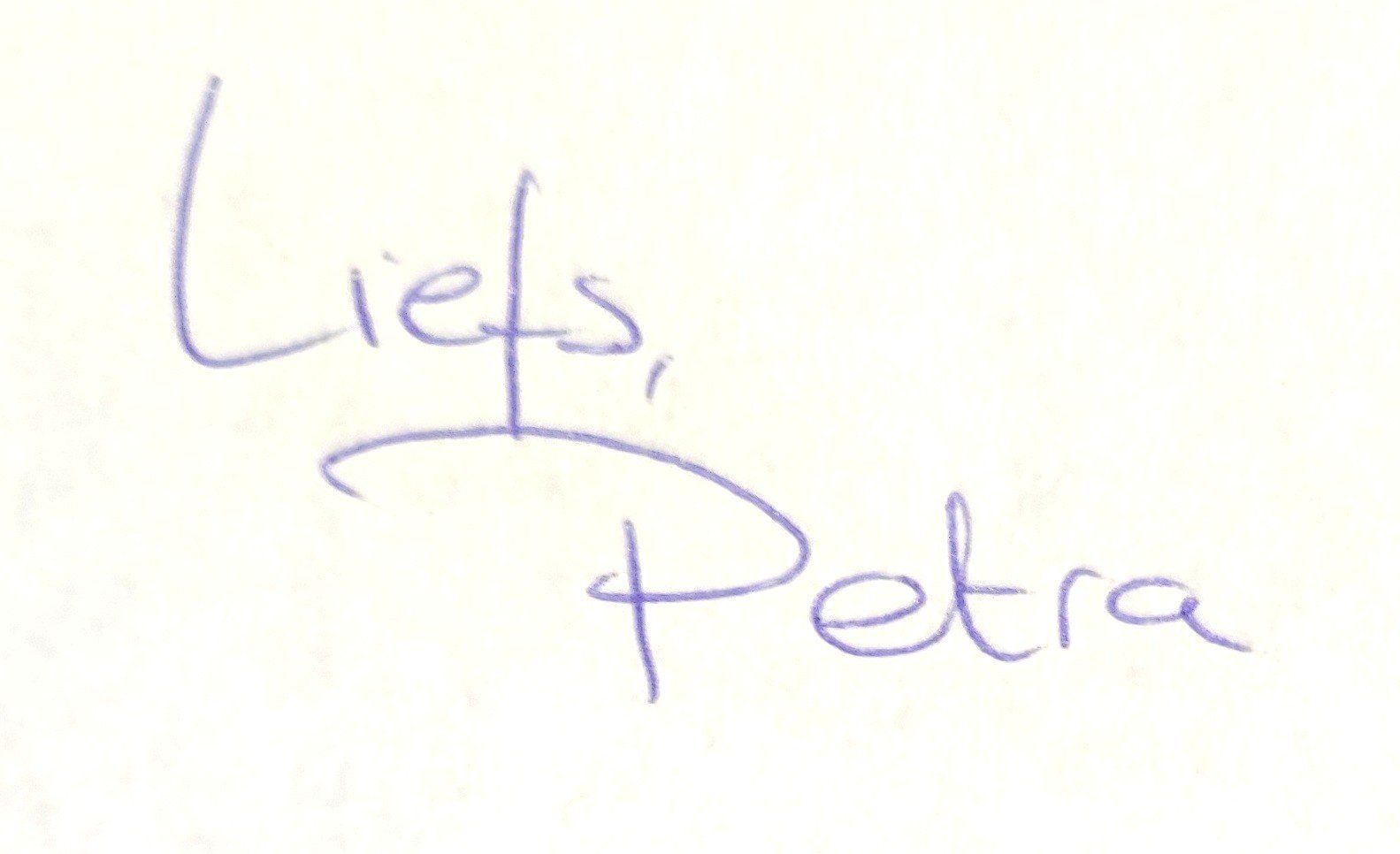 Handtekening in blauwe inkt: 