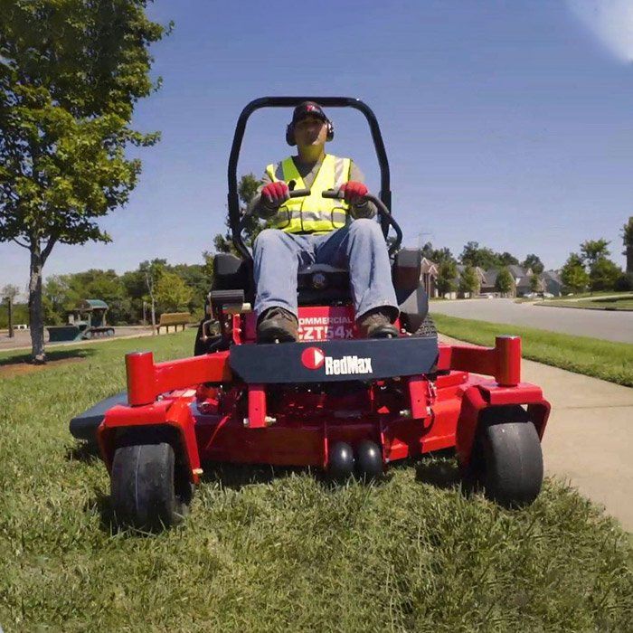Gardener Mowing The Lawn — Mower Shop In Murwillumbah, NSW