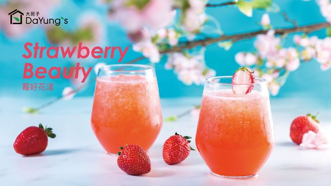 Two strawberry drinks with mint and whole strawberries on a pastel floral background