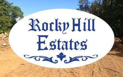 A sign that says rocky hill estates on it