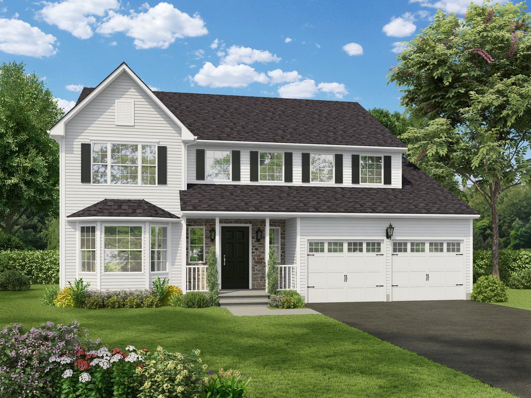 A white house with a black roof and black shutters is sitting on top of a lush green lawn.