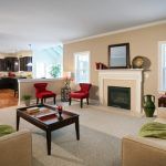 A living room filled with furniture and a fireplace.