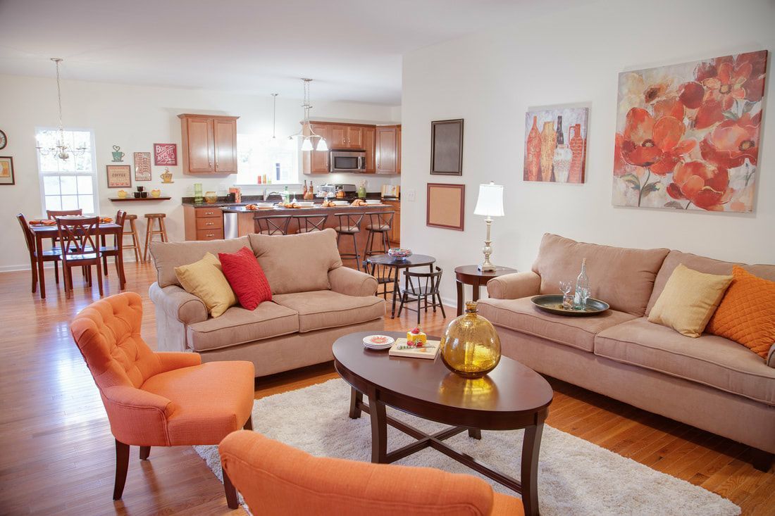 A living room filled with furniture and a coffee table.