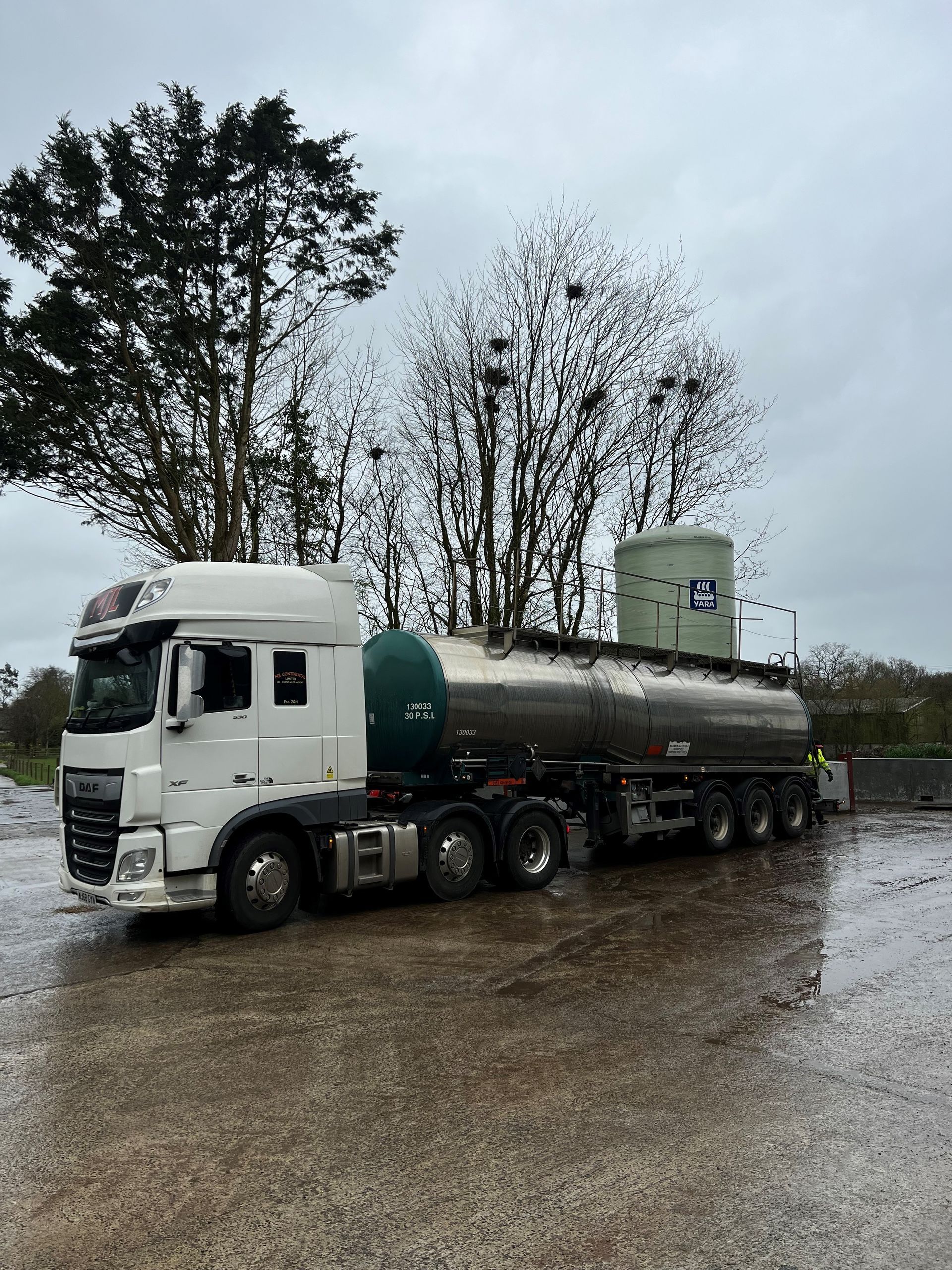 a daf truck is parked in a parking lot