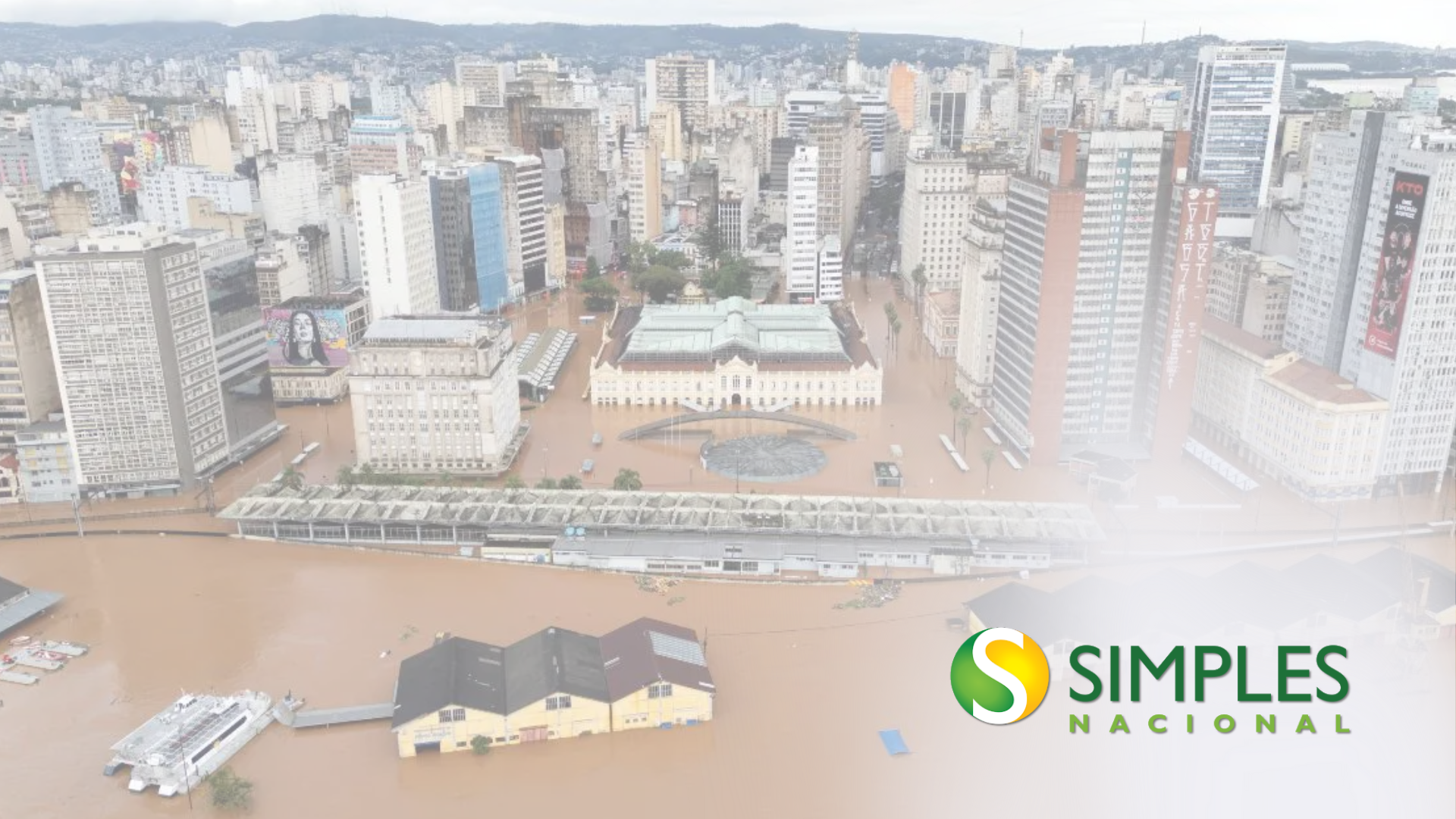 Uma vista aérea de uma cidade inundada com edifícios cobertos de água.