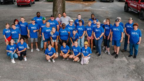 Volunteers and community members restoring a building in Cross City, Florida