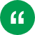 White left quotation mark on a green circular background.