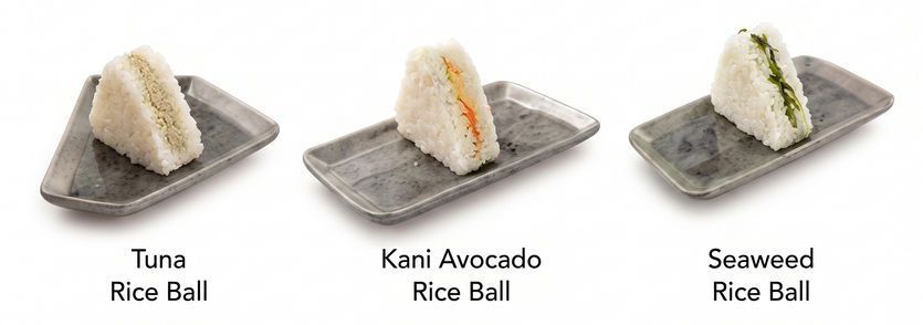 Three sushi rice ball varieties on gray plates: tuna, kani avocado, and seaweed rice balls.