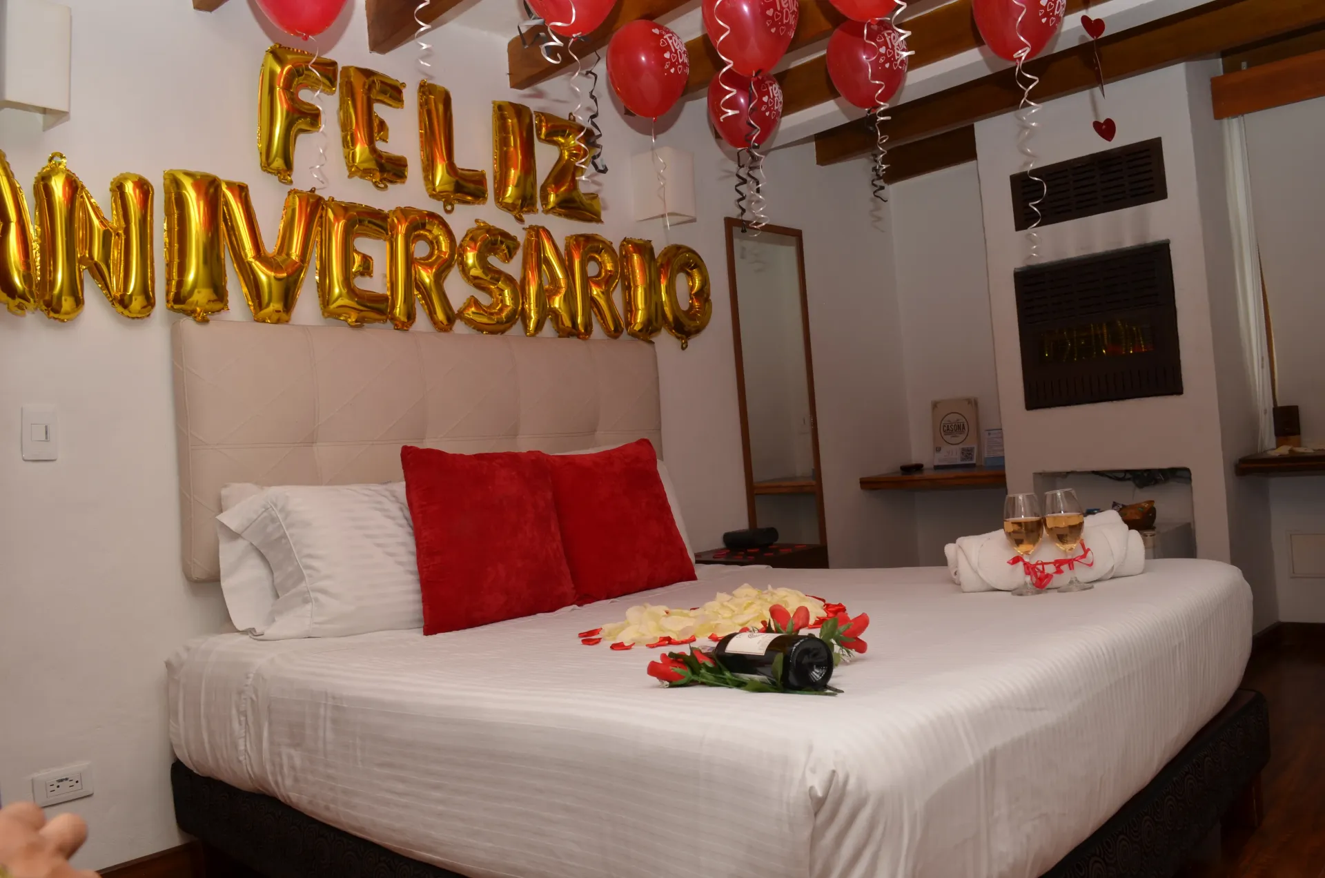 Bedroom decorated with balloons and 