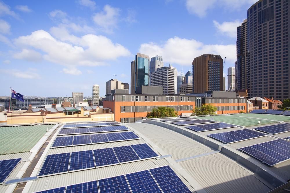 A Roof With a Lot of Solar Panels on It — Power & Data Support Services In Atherton, QLD
