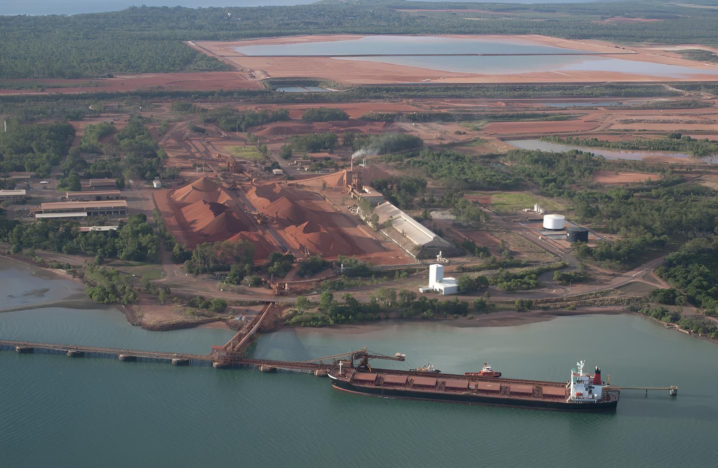 An Aerial View of a Large Ship in the Middle of a Body of Water — Power & Data Support Services In Weipa, QLD