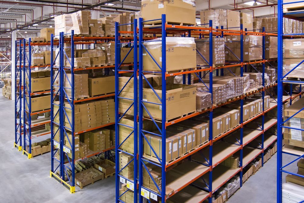 A Warehouse Filled With Lots Of Boxes — Shop Fittings Office Furniture Materials Handling In Eastern Creek, NSW