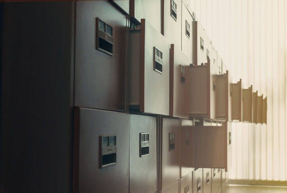 A Row Of Filing Cabinets Stacked On Top Of Each Other — Shop Fittings Office Furniture Materials Handling In Blacktown, NSW