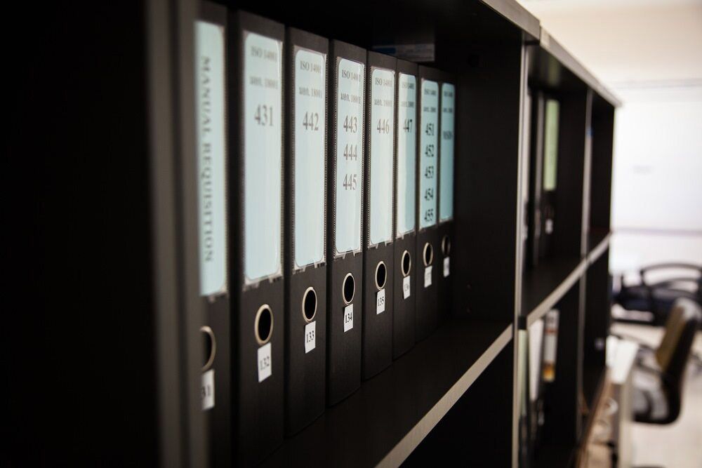 A Row Of Binders On A Shelf — Shop Fittings Office Furniture Materials Handling In Blacktown, NSW