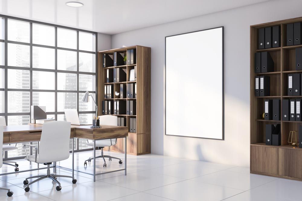 A Modern Office With A Large White Poster On The Wall — Shop Fittings Office Furniture Materials Handling In Gosford, NSW