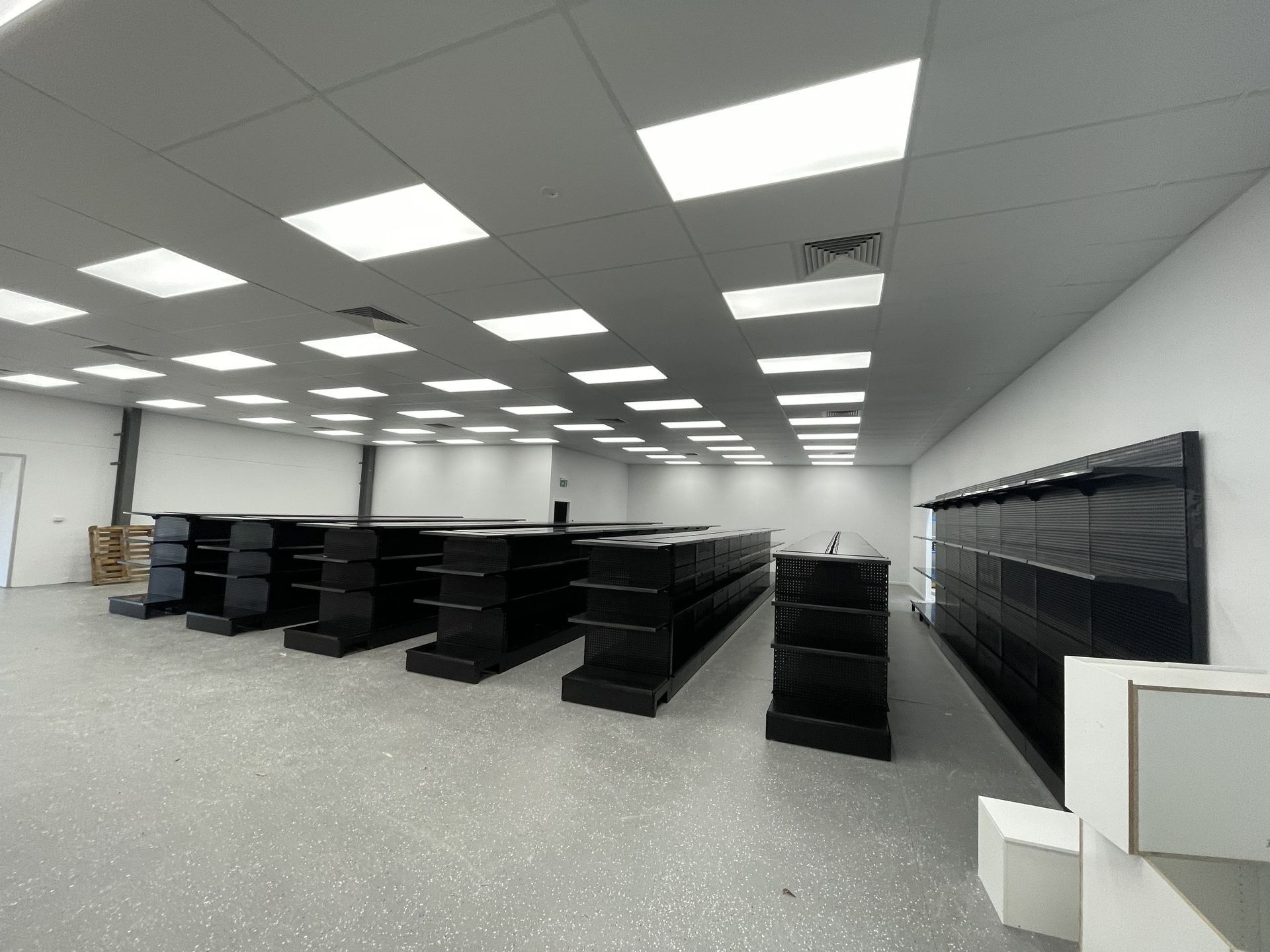 A Grocery Store Aisle Filled With Lots Of Products — Shop Fittings Office Furniture Materials Handling In Gosford, NSW