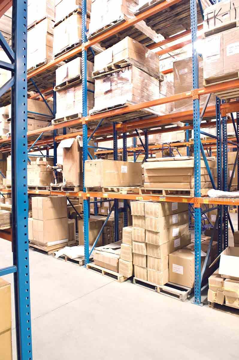 A Large Warehouse Filled With Lots Of Boxes — Shop Fittings Office Furniture Materials Handling In Blacktown, NSW