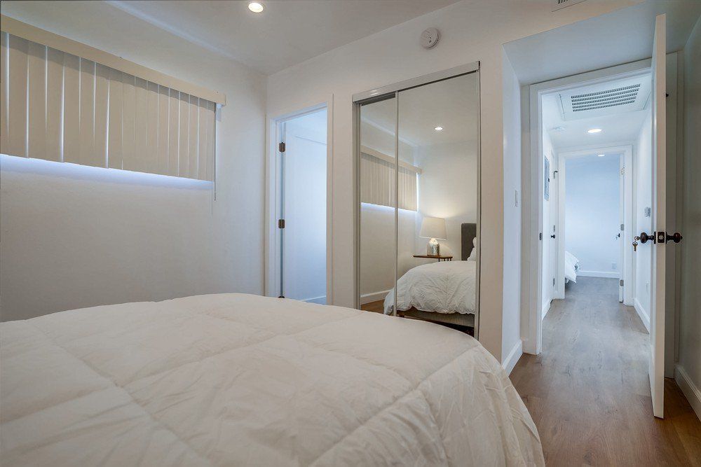 12547 Chandler Blvd. bedroom - bed and closet