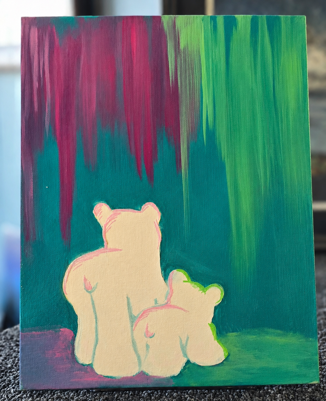 Two pastel teddy bears sitting together on a teal background with magenta and green streaks above.