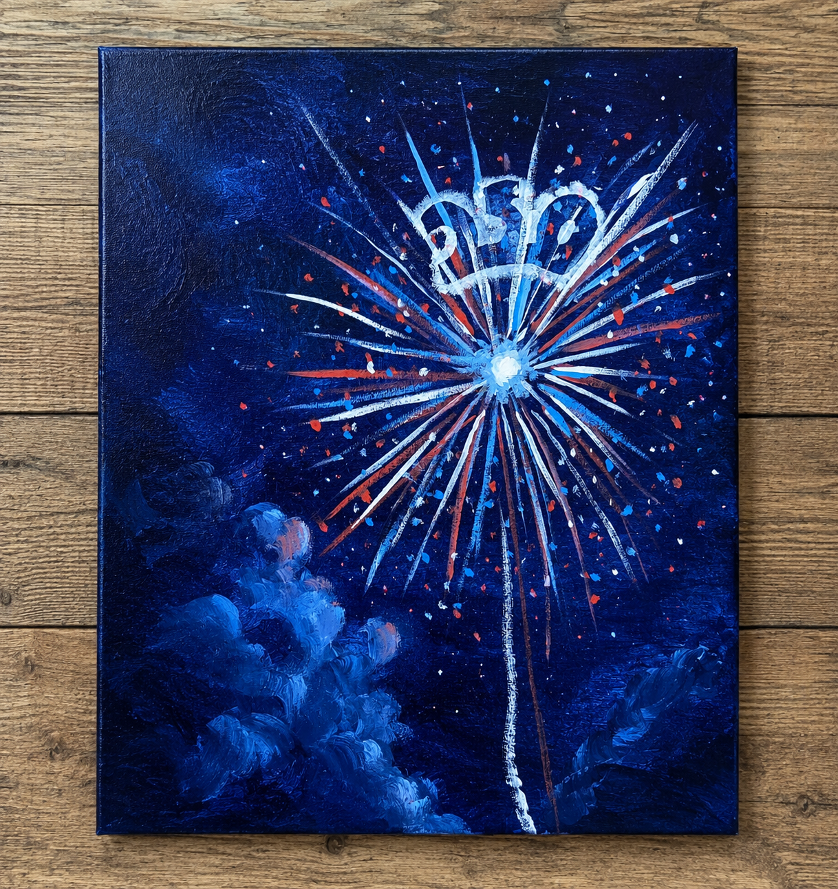 Blue fireworks burst against a dark night sky, with a bright central spark and streaks radiating outward.