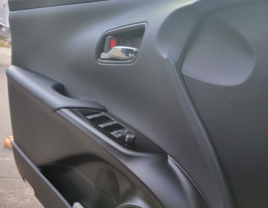 A close up of the inside of a car door