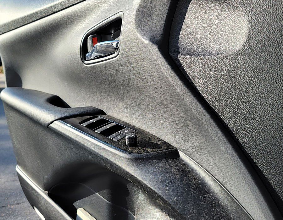 A close up of the inside of a car door